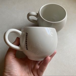 Pair of Starbucks white cafe mugs